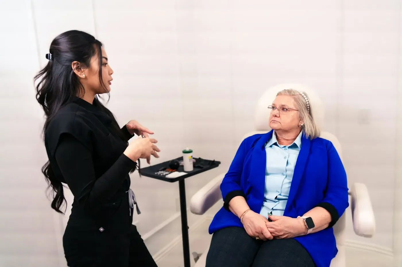 Consultation with a patient before an aesthetic treatment