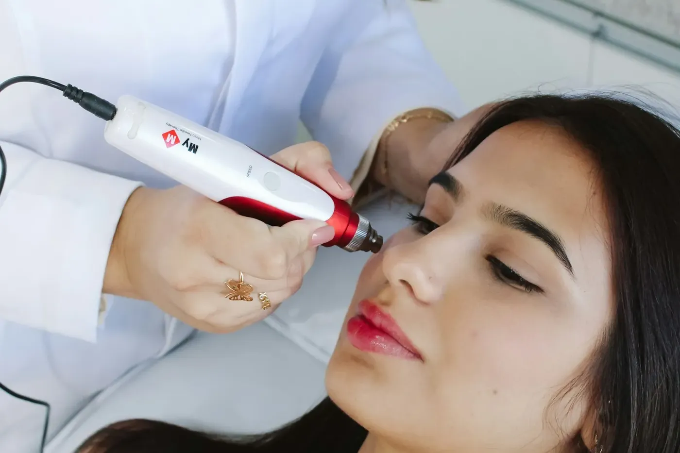 Cosmetic handheld device being used close to the face